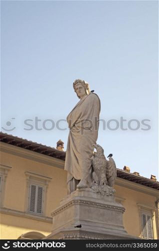 Statue of poet Dante Alighieri in Florence, in front of cathedral of Santa Croce