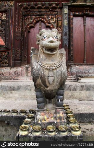 Statue of sacred cow near temple Changu Narayan in Bhaktapur, Nepal