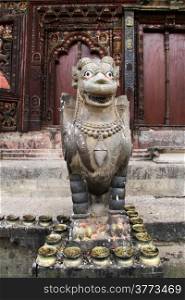 Statue of sacred cow near temple Changu Narayan in Bhaktapur, Nepal