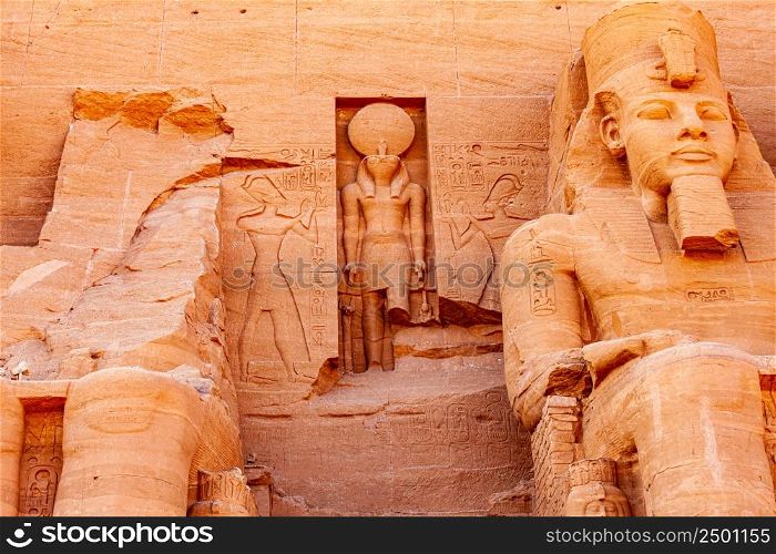 Statue of seated pharaoh Ramesses II and Ra Horakhty at The Great Temple of Rameses II in Abu Simbel Village, Aswan, Upper Egypt.