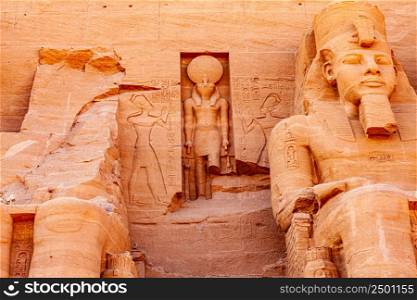 Statue of seated pharaoh Ramesses II and Ra Horakhty at The Great Temple of Rameses II in Abu Simbel Village, Aswan, Upper Egypt.