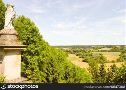 Statue of the Virgin Mary . Statue of the Virgin Mary overlooking a valley in the department of the Meuse in France