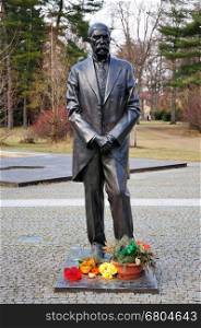 Statue of Tomas Garrigue Masaryk with memories candles in Podebrady city, Czech Republic.