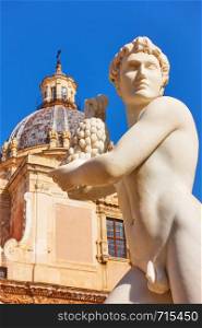 Statue of young man with grapes in The Praetorian Fountain by Francesco Camilliani (Fountain of Shame, 1574) in Piazza Pretoria in Palermo, Sicily, Italy