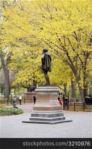 Statue on a pedestal in a park, Central Park, Manhattan, New York City, New York State, USA