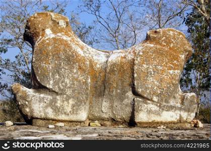 Statue on the stoun near palace in Uxmal, Mexico