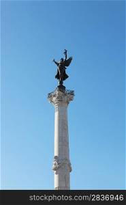 Statue on top of a column