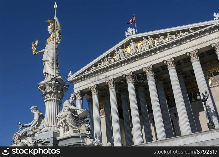 Statues at the Parliament Buildings on Ringstrabe in Vienna, Austria. The Austrian Parliament is the bicameral legislature in Austria. It consists of two chambers: the National Council (Nationalrat) and the Federal Council.