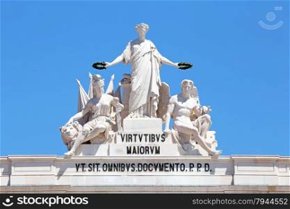 Statues at the top of Rua Augusta Arch in Lisbon, Portugal. Allegory of Glory rewarding Valor and Genius.