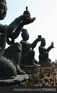 Statues in a monastery, Tian Tan Buddha, Po Lin Monastery, Ngong Ping, Lantau, Hong Kong, China
