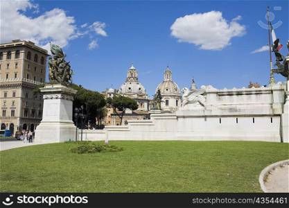 Statues in front of a building, Santa Maria Dei Miracoli, Santa Maria Di Montesanto, Piazza Del Popolo, Rome, Italy