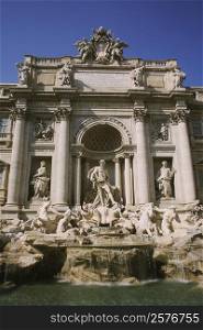 Statues in front of a building, Trevi Fountain, Rome, Italy