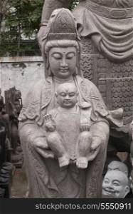 Statues in Panjiayuan antique market, Beijing, China