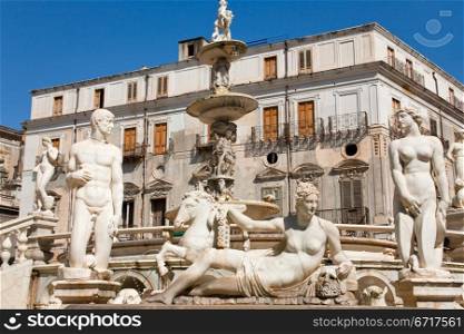 statues of fountain Pretoria in Palermo, Sicily, Italy