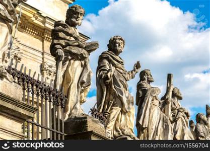 Statues of Saints Peter on Paul church in Krakow in a beautiful summer day, Poland