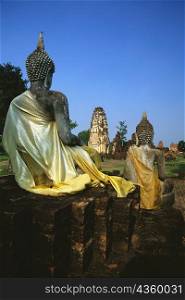 Statues of sitting Buddha at a temple, Wat Phra Phai Luang, Thailand
