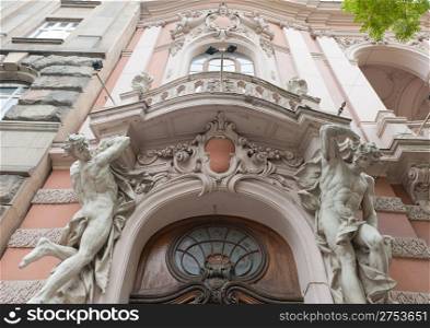 Statues of the man supporting a balcony. Lvov. Ukraine