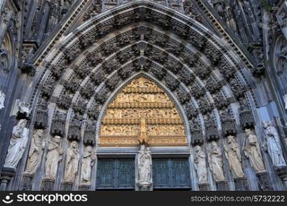 Statues of the saints above the entrance of Cologne cathedral, Germany&#xA;