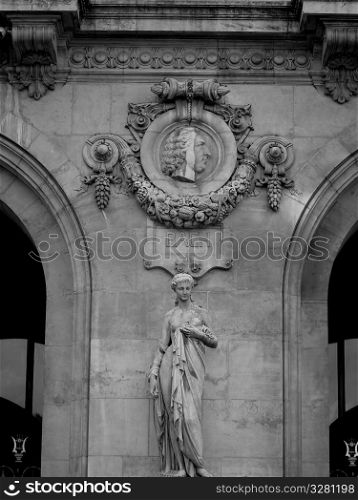 Statues on a building in Paris France
