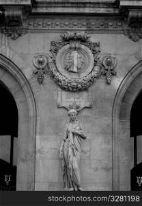 Statues on a building in Paris France
