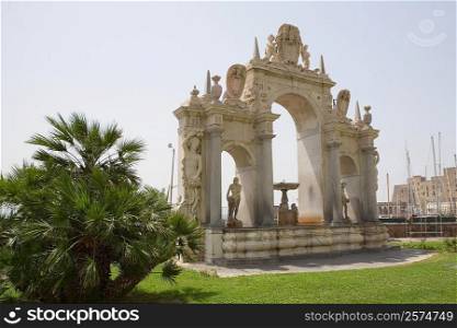 Statues on a fountain, La Fontana dell&acute;Immacolatella, Naples, Naples Province, Campania, Italy