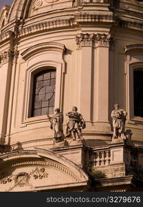 Statues on ancient building in Rome Italy