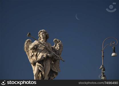 Statues on the bridge of St. Angel. Rome. Italy