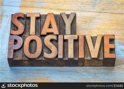stay positive - motivational word abstract in vintage letterpress printing blocks