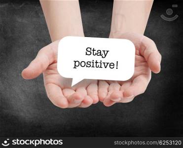 Stay positive written on a speechbubble