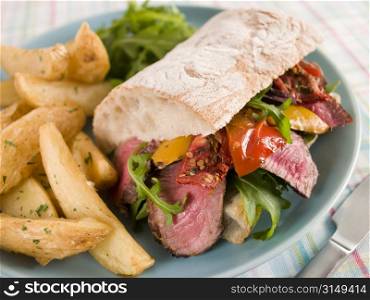 Steak and Roasted Pepper Ciabatta Sandwich with Spiced Potato Wedges