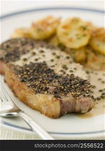 Steak au Poirve&acute; with Saut Potatoes