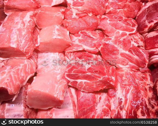 Steaks from beef and pork meat. Steaks from beef and pork red meat in market