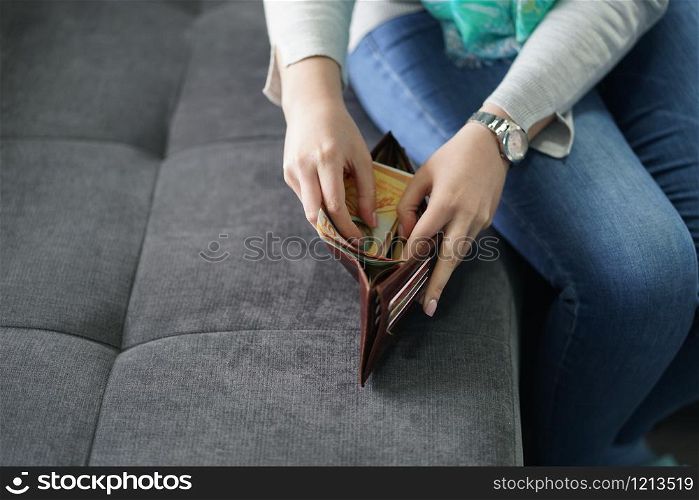 Stealing money from the wallet from husband at home