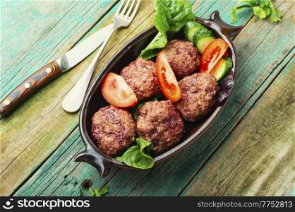 Steam cutlets or rissole and vegetables. Homemade dietary meatballs.. Homemade steamed meatballs