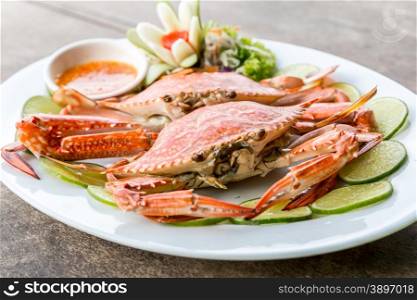 steam red crab with lemon lime and spicy seafood sauce