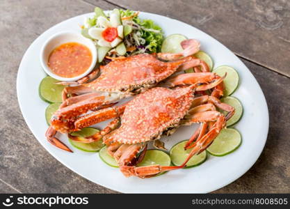 steam red crab with lemon lime and spicy seafood sauce