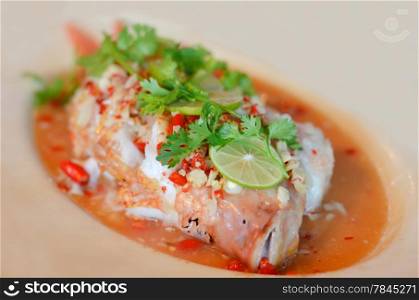 Steamed fish with chili and lemon , hot and spicy