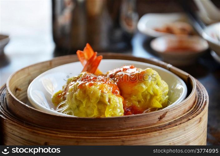Steamed shrimp dumplings dim sum , cellophane noodle and delicious sauce