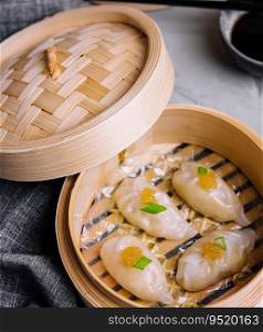 Steamed shrimp dumplings dim sum with pike caviar