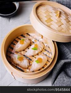 Steamed shrimp dumplings dim sum with pike caviar