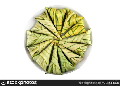 steamed sticky rice in mangrove fan palm leaf isolated on white background with clipping path
