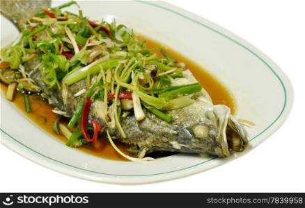 Steamed tubtim fish with light soy sauce