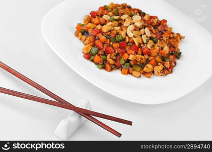 steamed vegetables and meat with peanut on plate. Chinese cuisine.