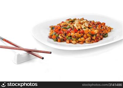 steamed vegetables and meat with peanut on plate. Chinese cuisine.