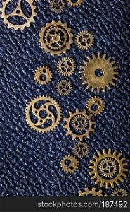 steampunk mechanical cogs gears wheels on leathern background