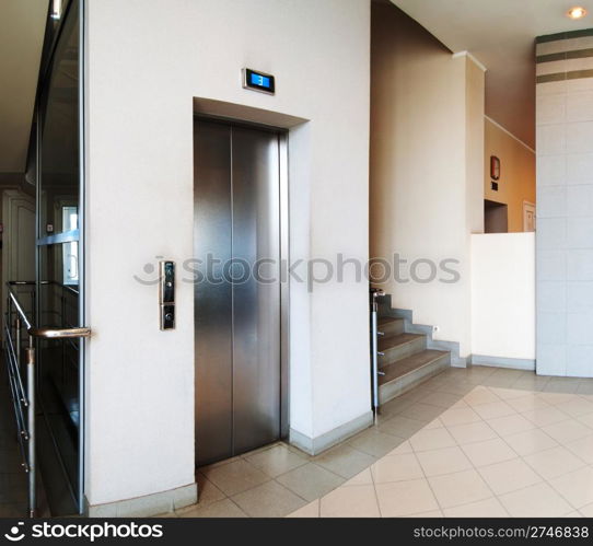 Steel door of the elevator on the 3rd floor