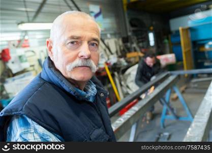 steel frame factory worker