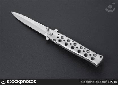 Steel knife on black