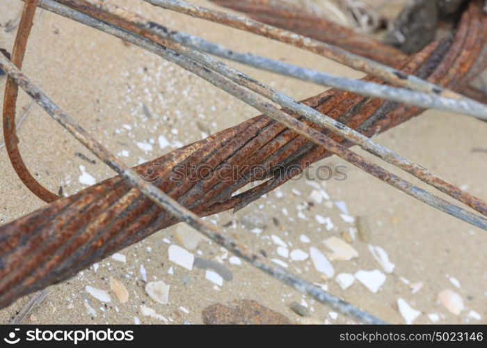 Steel rusty wire and wire on a concrete background. Steel rusty wire and wire on a concrete background.