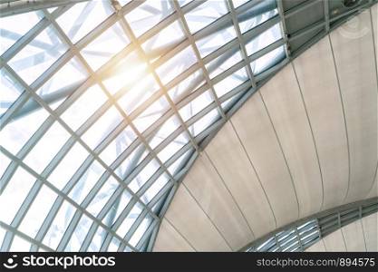 Steel structure of modern office building roof. Metal windows glass facade frames supported. Abstract interior architecture design decoration background.